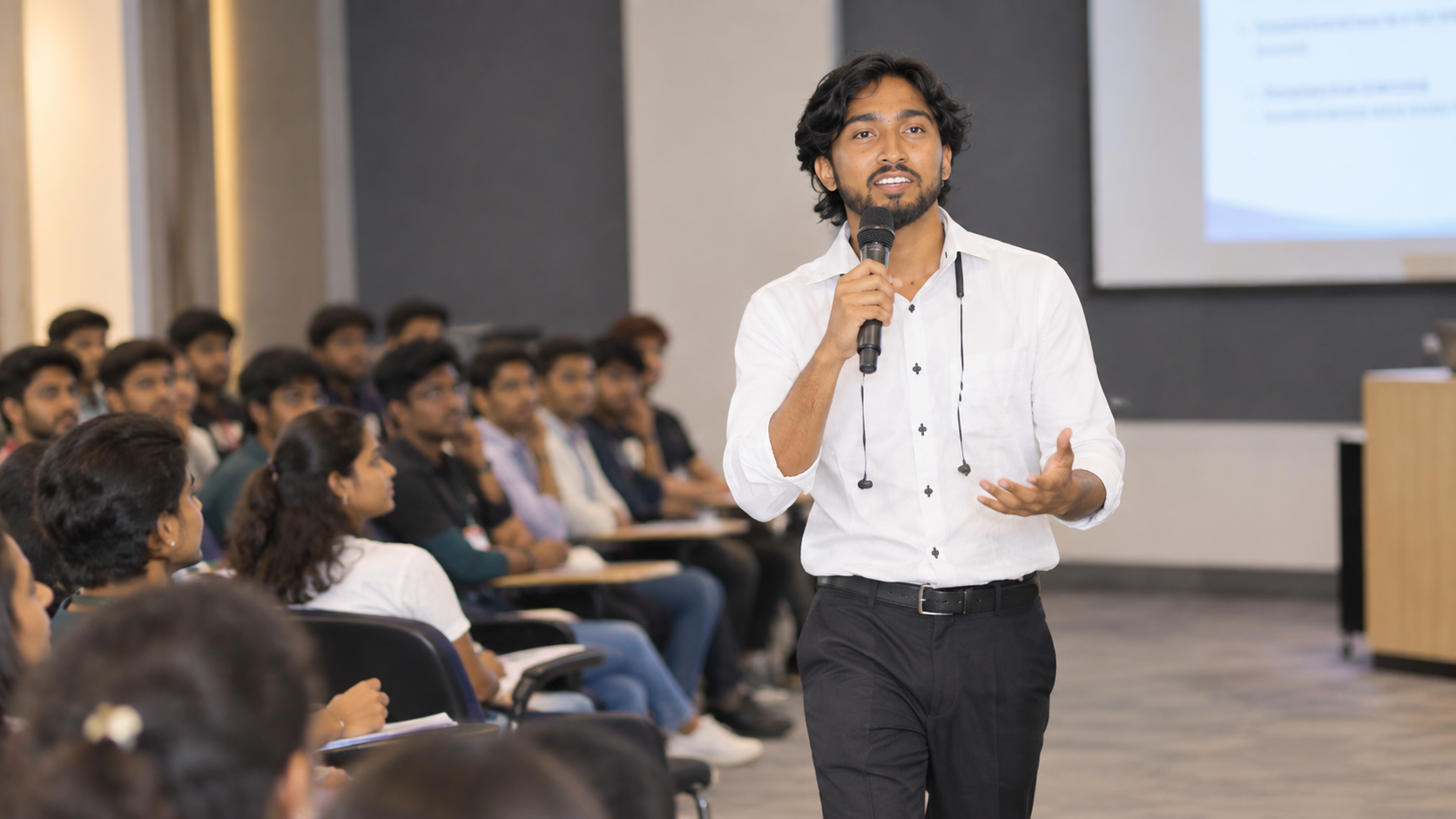 Wishva Kanchana speaking to students in a lecture hall